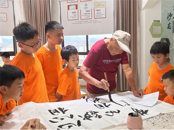 北仑区春晓成校洋沙山社区假日学校：“墨香迎亚运 多彩过暑假”.png